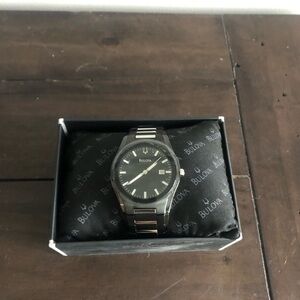 Bulova black watch.
